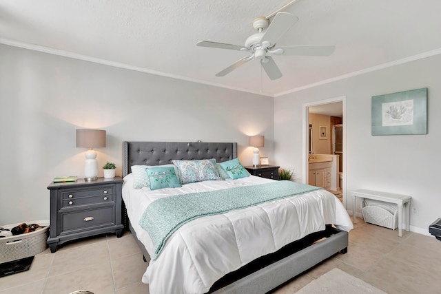 tiled bedroom featuring crown molding, ceiling fan, and ensuite bathroom