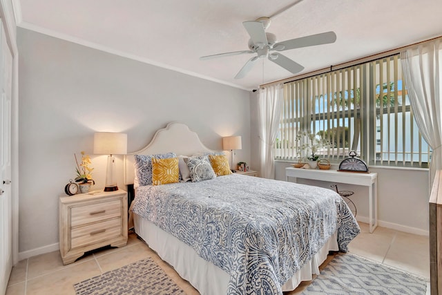 bedroom with ornamental molding, a closet, ceiling fan, and light tile patterned floors