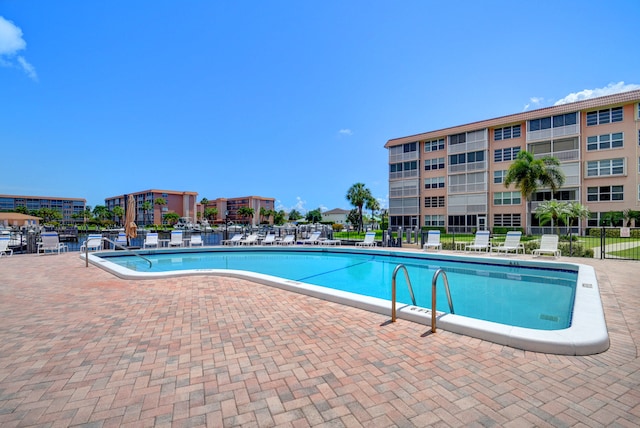 view of pool featuring a patio area