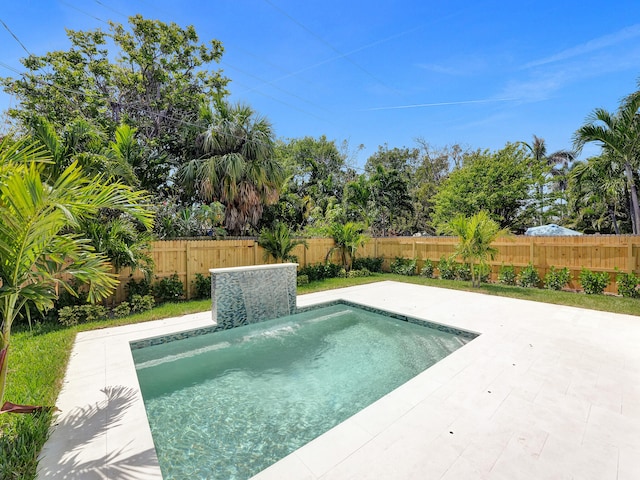 view of pool featuring a patio and pool water feature