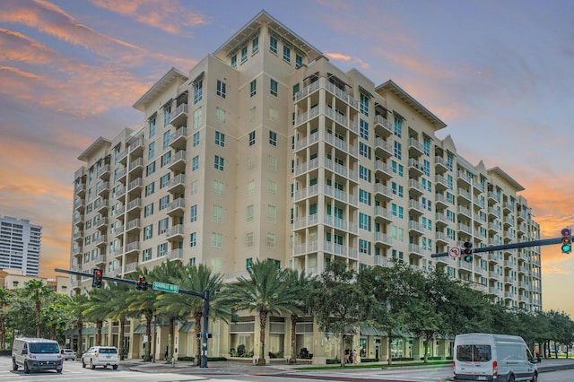 view of outdoor building at dusk