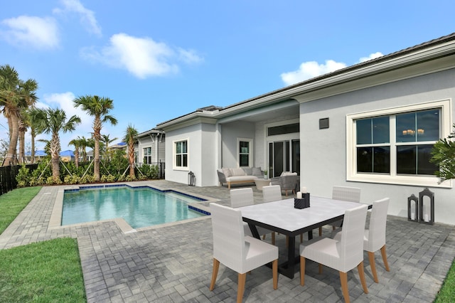 view of pool featuring a patio