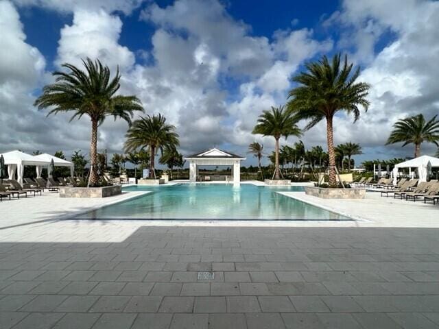 view of pool with a gazebo and a patio