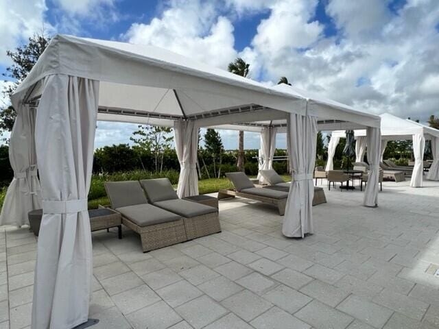 view of patio / terrace featuring outdoor lounge area and a gazebo