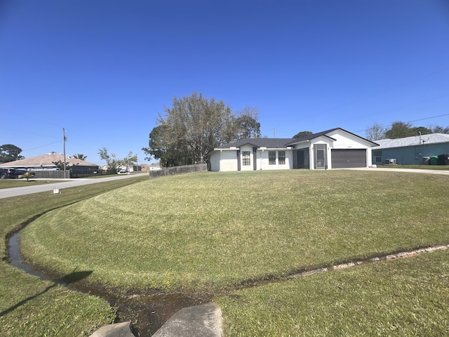 view of yard featuring a garage