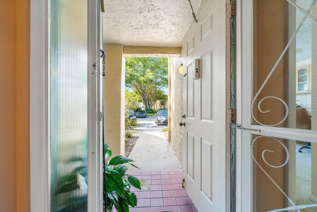 5087 Oak Hill Ln Unit 315, Delray Beach, FL 33484 - entryway featuring tile patterned flooring