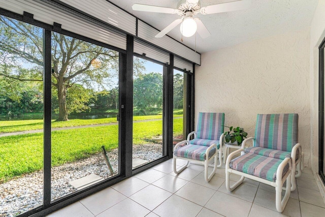 5087 Oak Hill Ln Unit 315, Delray Beach, FL 33484 - sunroom with a water view and ceiling fan