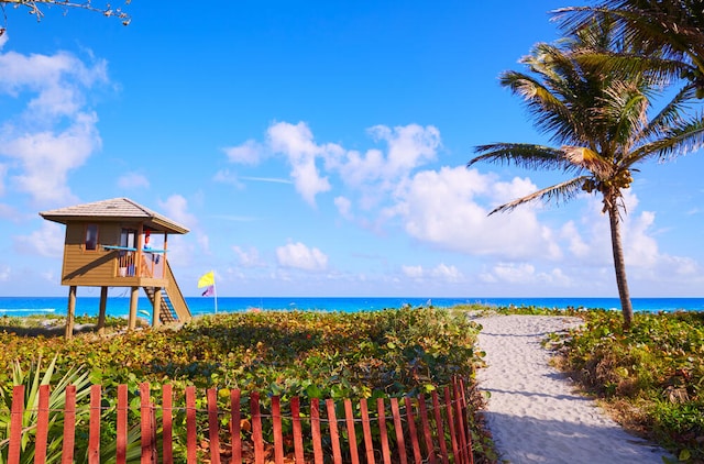 5087 Oak Hill Ln Unit 315, Delray Beach, FL 33484 - property view of water with stairs and a beach view