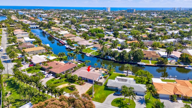 bird's eye view with a water view