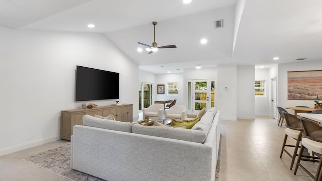 living room featuring high vaulted ceiling, light tile flooring, and ceiling fan