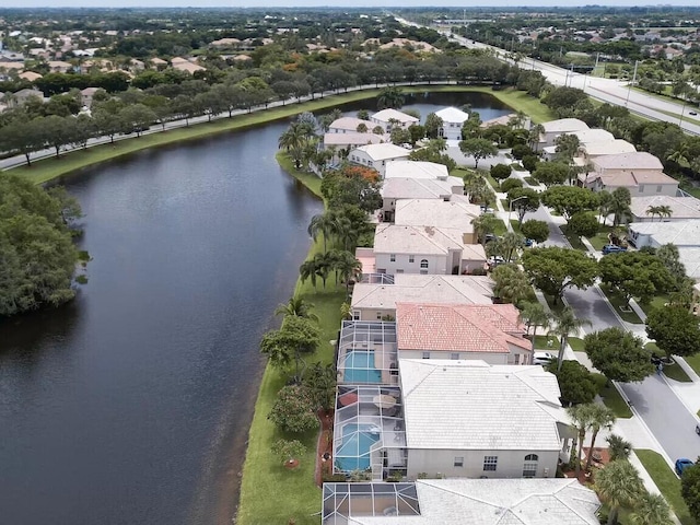 bird's eye view with a water view