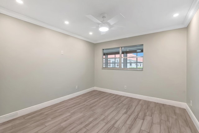 empty room with crown molding, ceiling fan, and light wood-type flooring