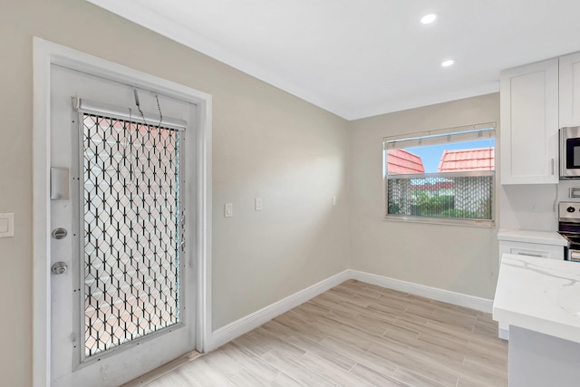 interior space with light hardwood / wood-style floors