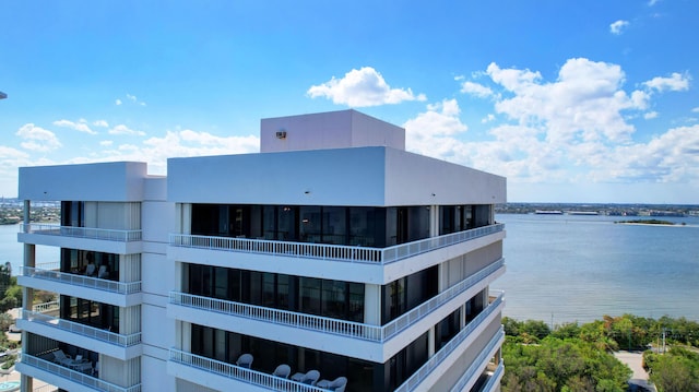 view of building exterior featuring a water view