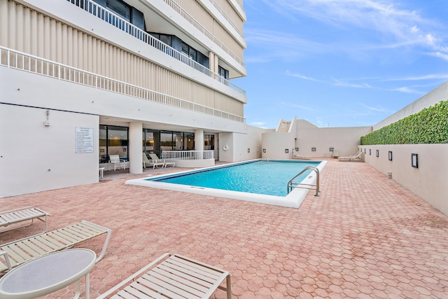 view of pool with a patio