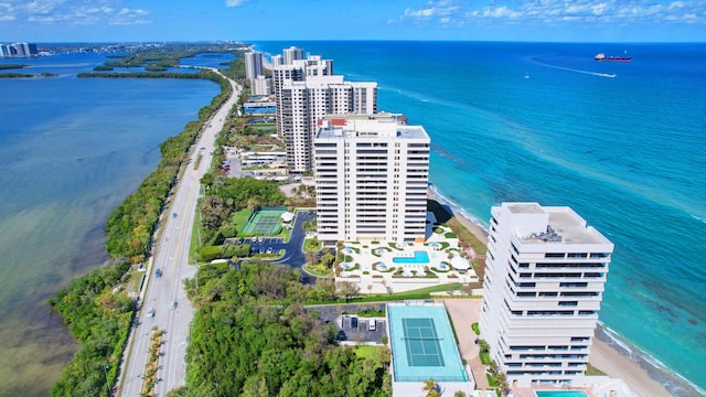 bird's eye view featuring a view of the beach and a water view