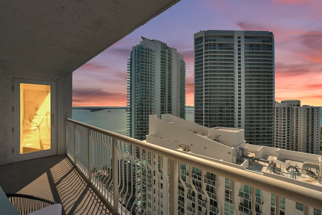 view of balcony at dusk