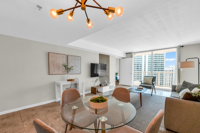 living room with an inviting chandelier, expansive windows, and light tile floors