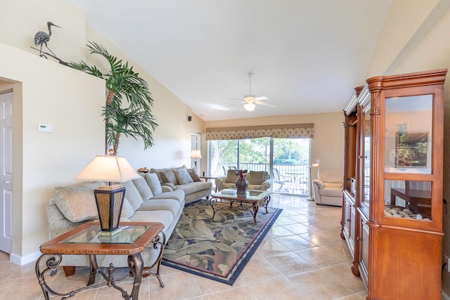 living room featuring light tile flooring and ceiling fan