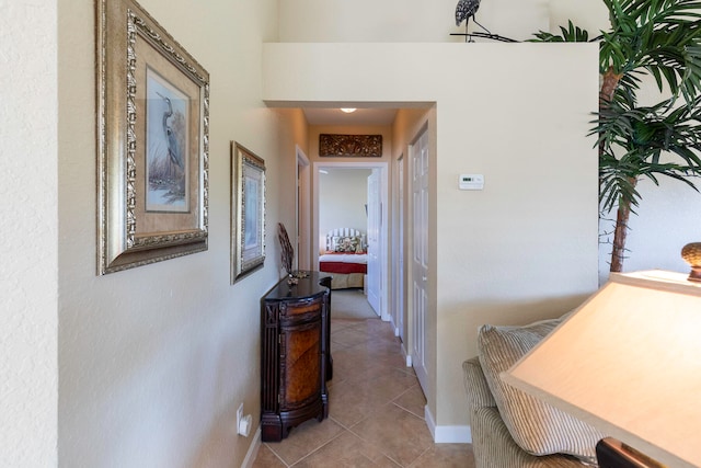 hallway with light tile floors