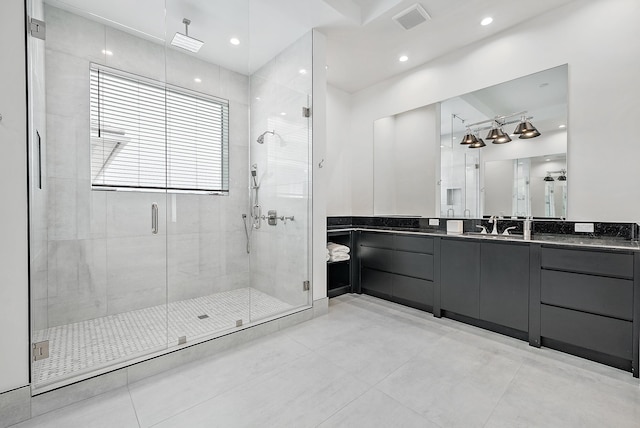 full bathroom with recessed lighting, visible vents, a shower stall, and vanity