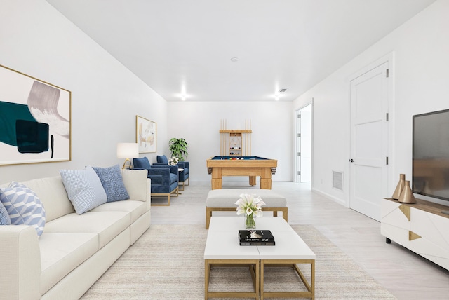 living area with light wood-type flooring, billiards, visible vents, and baseboards