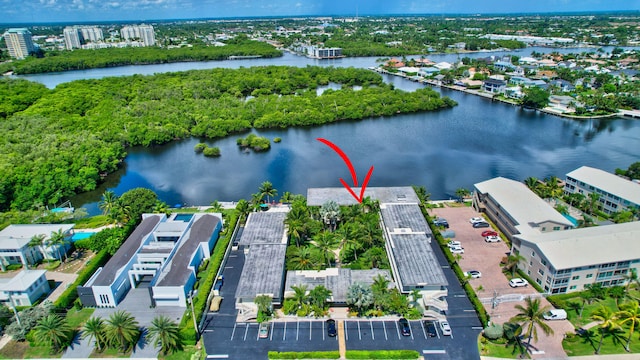 drone / aerial view with a water view