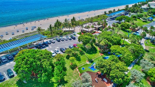 aerial view with a view of the beach and a water view