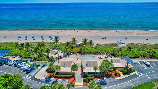 aerial view with a beach view and a water view