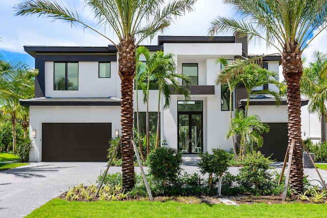 view of front of house featuring french doors and a garage