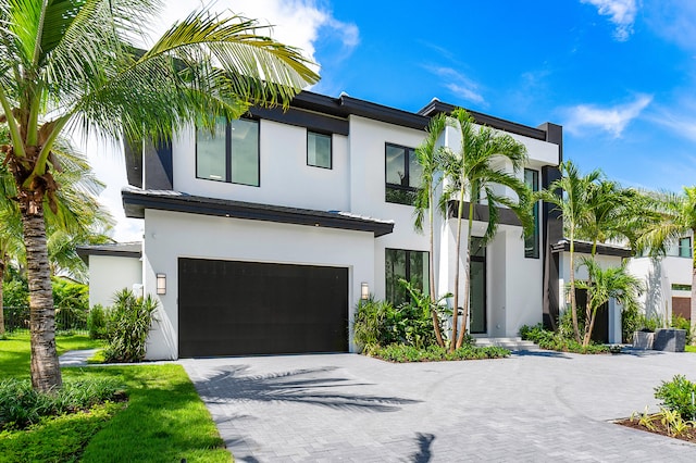 view of front of property with a garage