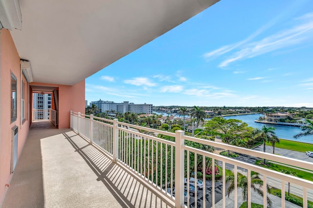 balcony featuring a water view