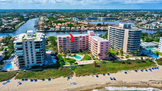 birds eye view of property featuring a water view