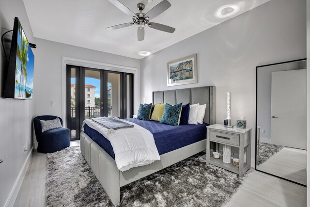 bedroom with light hardwood / wood-style flooring, ceiling fan, access to exterior, and french doors