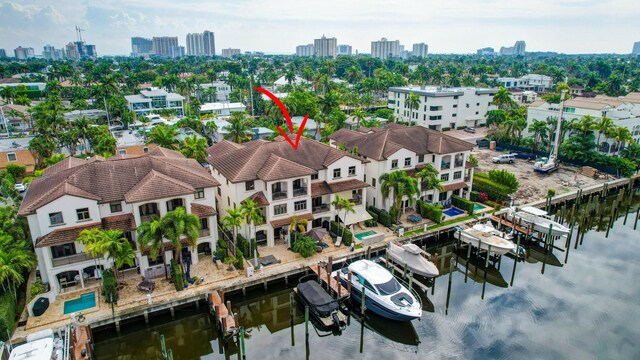 bird's eye view with a water view