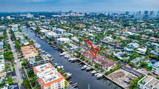 bird's eye view with a water view