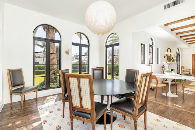 dining area featuring hardwood / wood-style floors and french doors