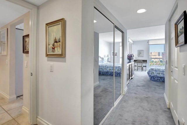 hallway with light tile floors