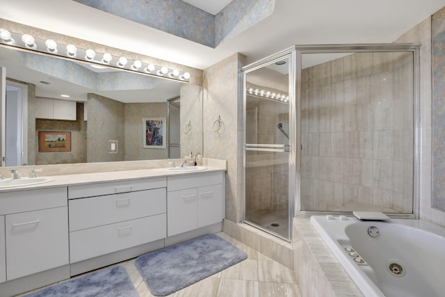 bathroom with independent shower and bath, dual bowl vanity, and tile floors