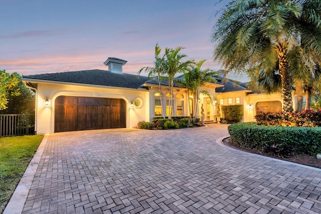 view of front of property featuring a garage