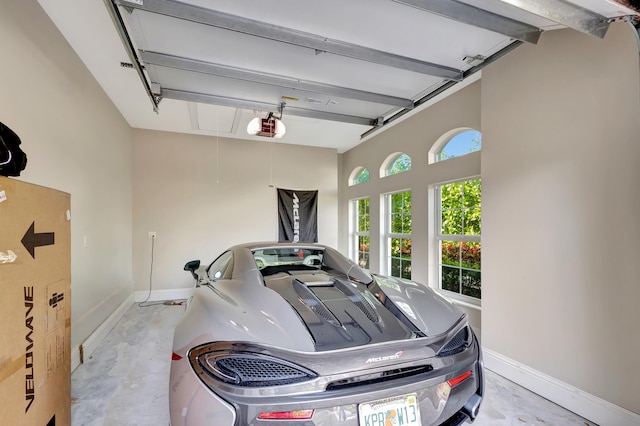 garage featuring a garage door opener