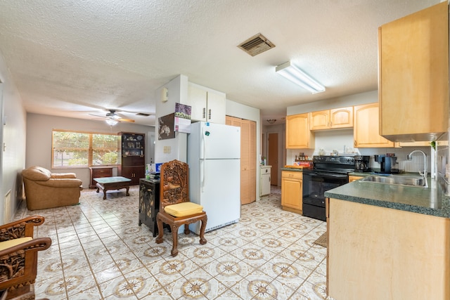 kitchen featuring ceiling fan, light brown cabinets, sink, black electric range oven, and white refrigerator