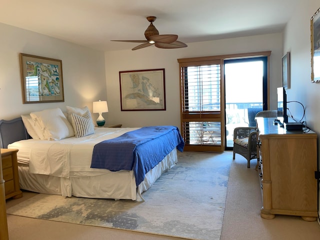 bedroom featuring light carpet and ceiling fan