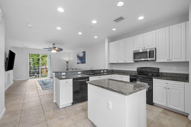 kitchen with a kitchen island, kitchen peninsula, ceiling fan, and black appliances