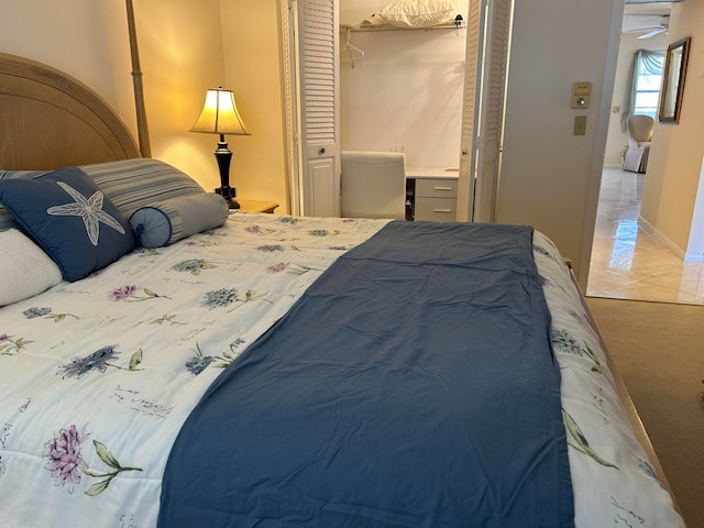 bedroom with light colored carpet