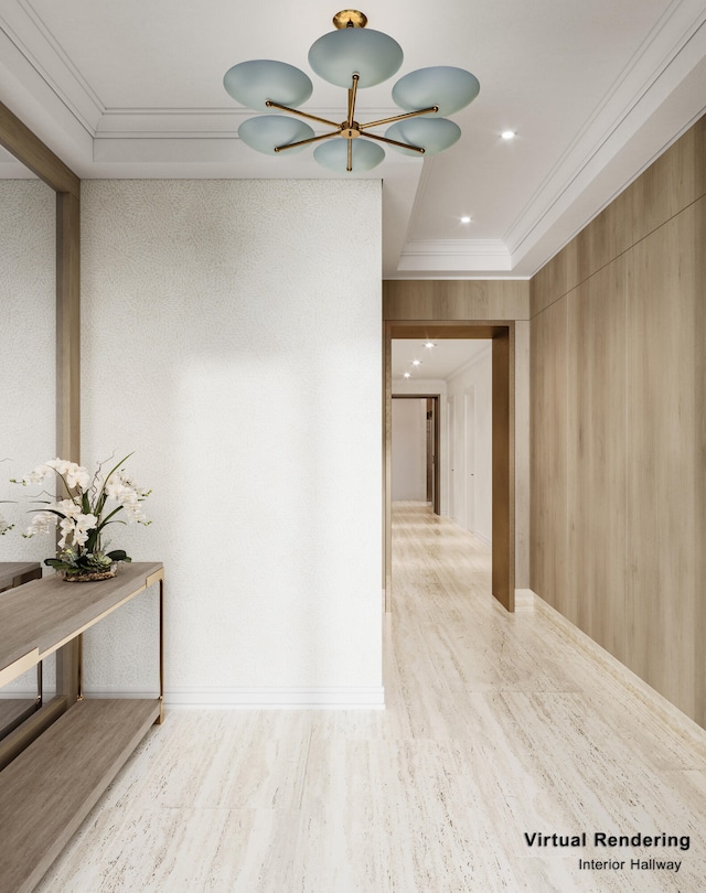 hall with a raised ceiling and ornamental molding