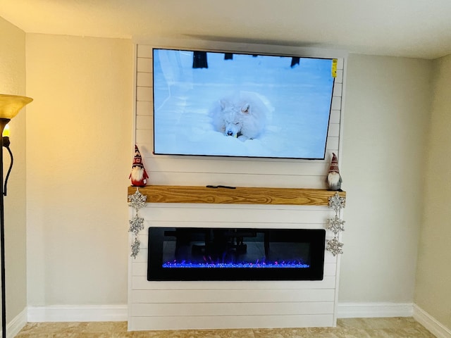 interior details featuring a large fireplace