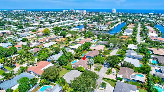 drone / aerial view with a water view