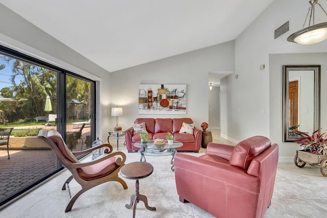 living room featuring light tile patterned flooring and lofted ceiling