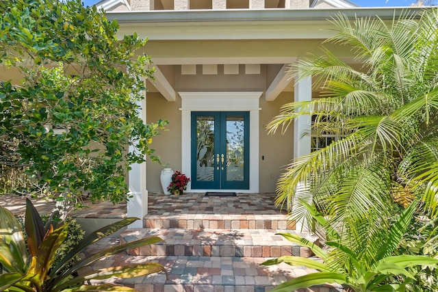 property entrance featuring french doors